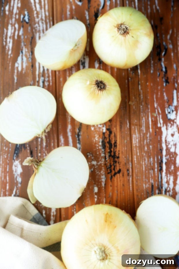 Overhead photo of onions whole and halved