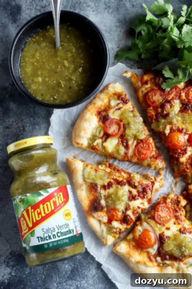 Overhead photo of salsa verde chorizo pizza