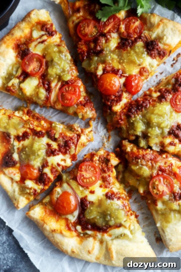 Slices of salsa verde chorizo pizza image