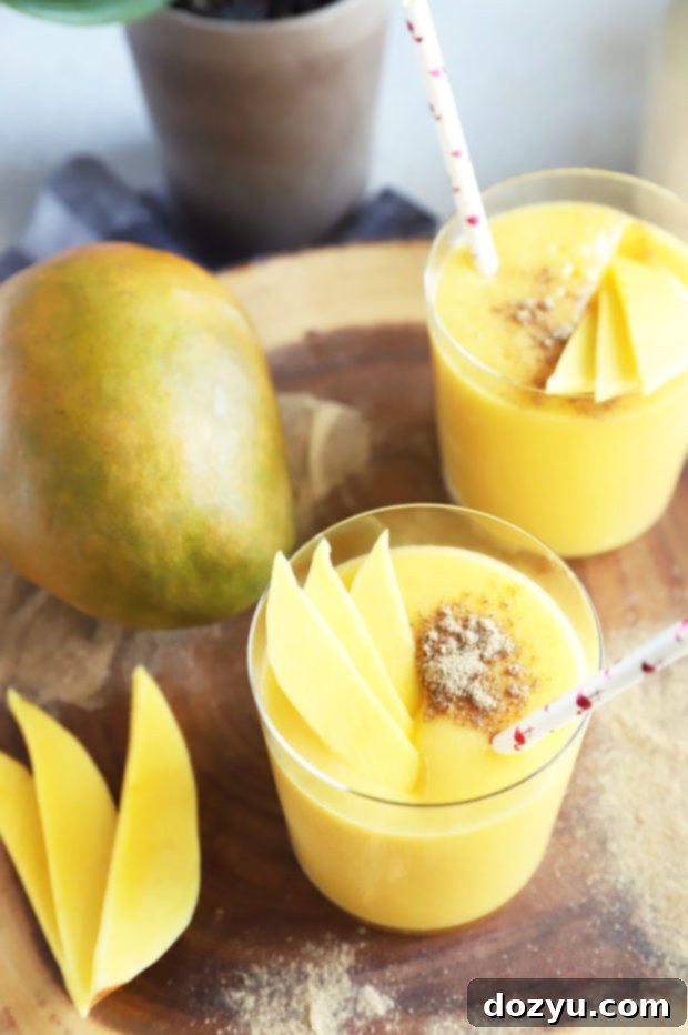 Tropical Mango Coconut Bliss 5 Side image of mango smoothie in glasses