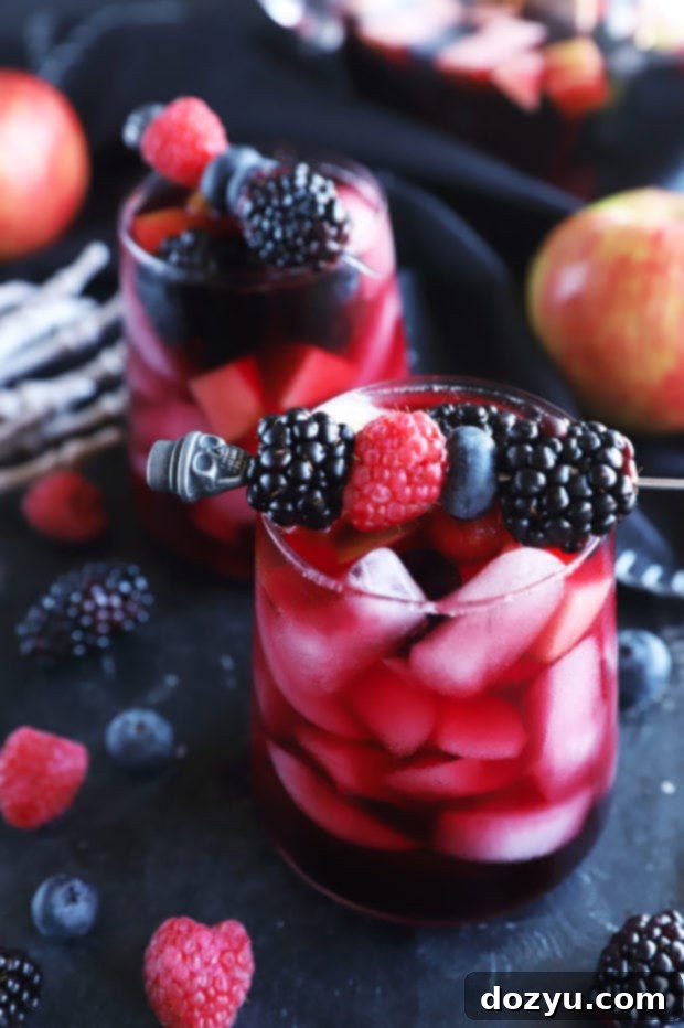 Side photo of berry sangria in a glass