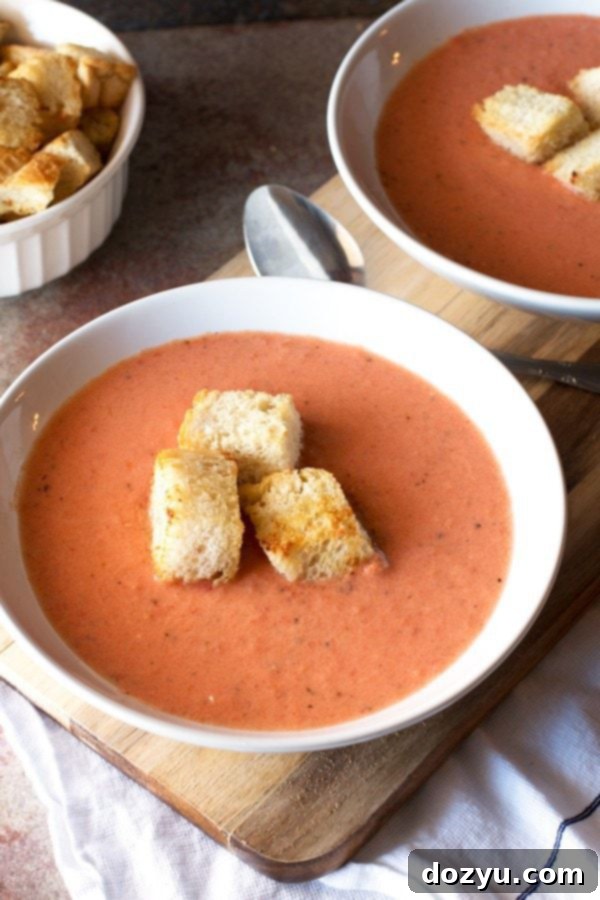 Creamy Charred Tomato Soup with Garlic Croutons | cakenknife.com