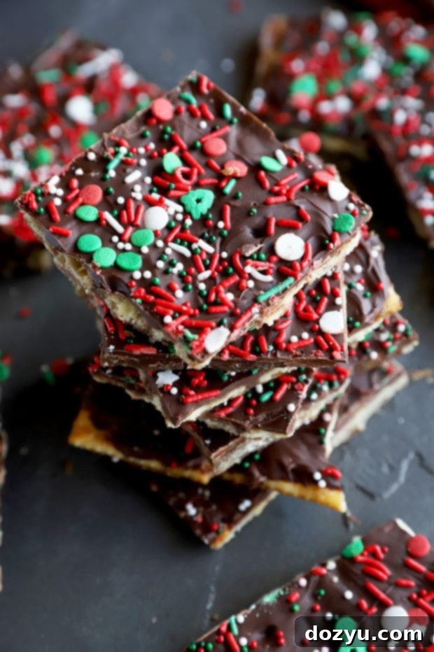 A generous pile of chocolate gingerbread toffee candy for Christmas, showcasing its rich texture and topping.