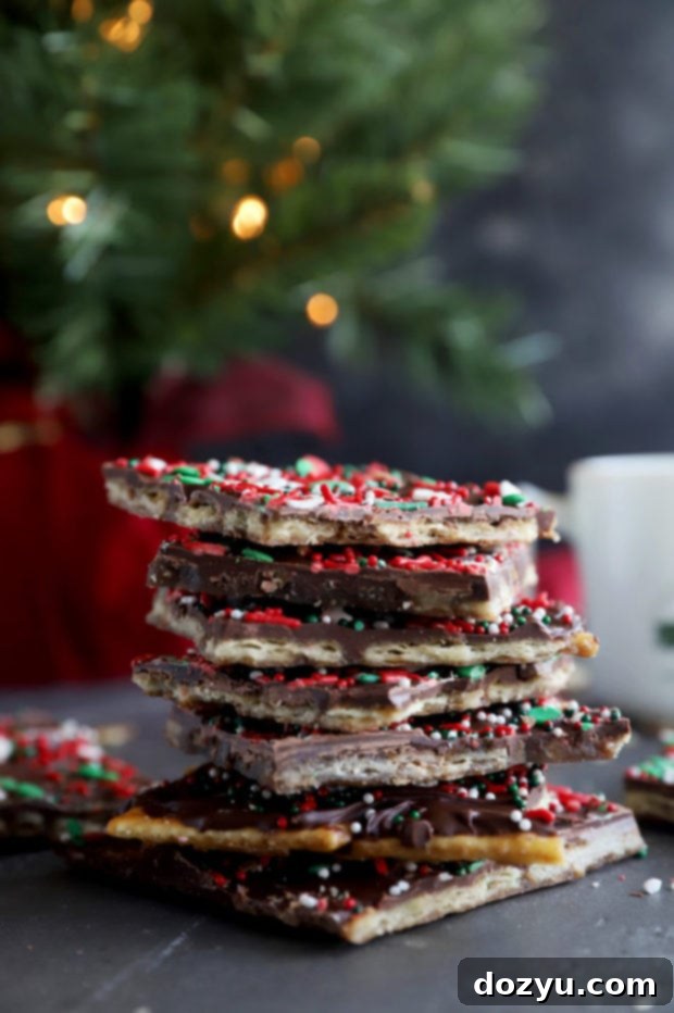 A large pile of Gingerbread Christmas Crack Candy, broken into pieces and ready to serve.