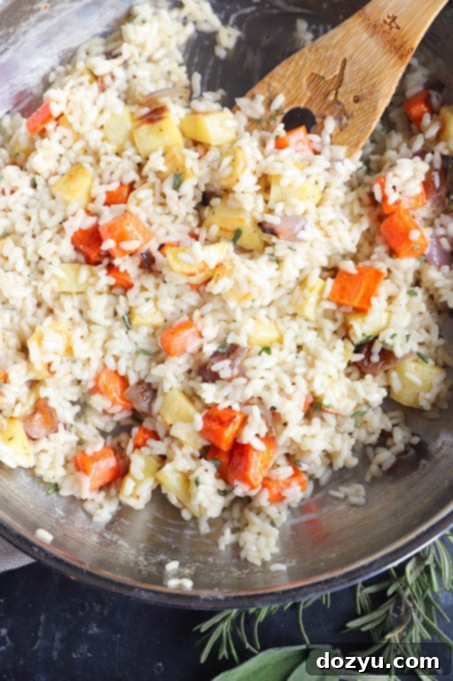 Winter vegetable risotto simmering in a large skillet, ready to be served