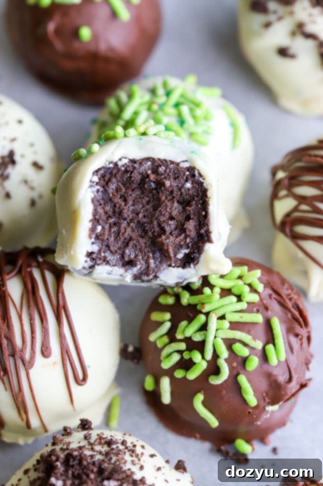 Decadent Oreo Bailey's Truffles 3 Bite taken out of a rich and creamy Oreo Bailey's truffle