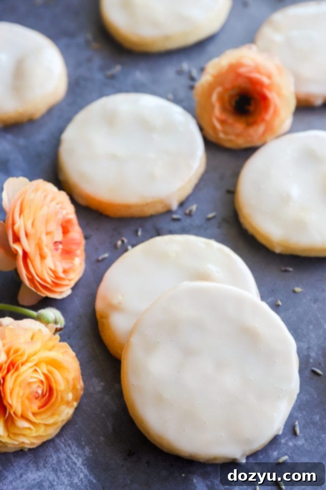 Lemon Lavender Shortbread Delights 6 Close-up of freshly baked lemon shortbread cookies, showcasing their delicate texture and golden edges.