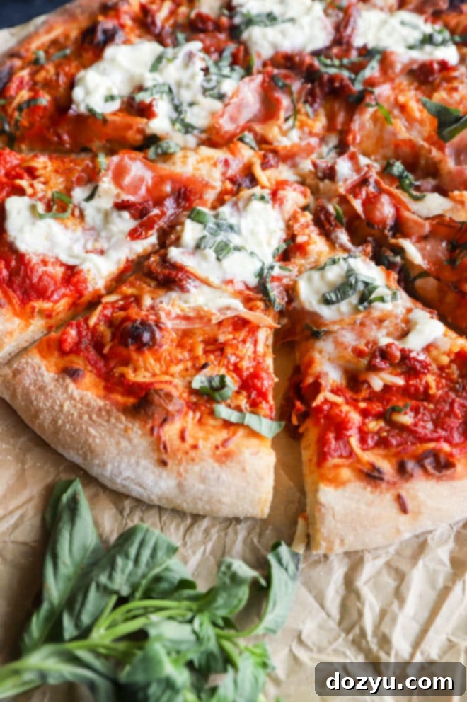 Two slices of grilled burrata pizza on a plate