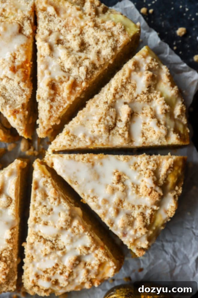 Overhead image of pumpkin spice coffee cake with a slice removed