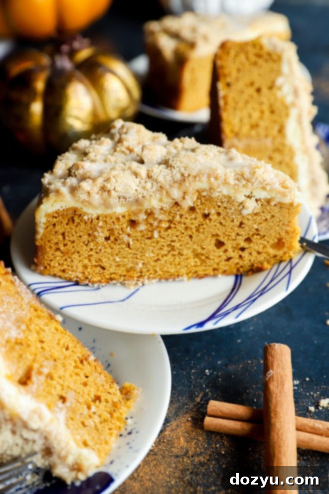 Side image of pumpkin pie cake with crumble topping