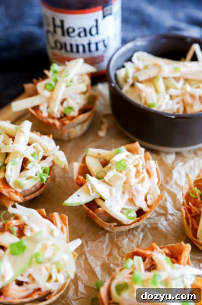 Various kitchen tools and ingredients for making the wonton cups, including a whisk, Head Country BBQ sauce, and wonton wrappers.
