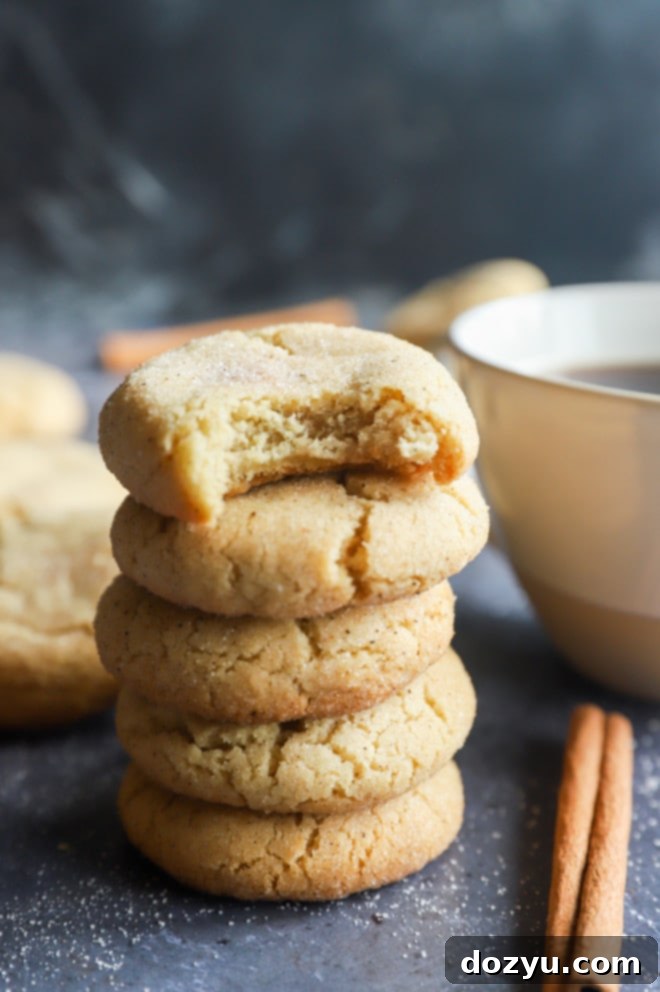 Chai snickerdoodle cookies in stack with coffee mug
