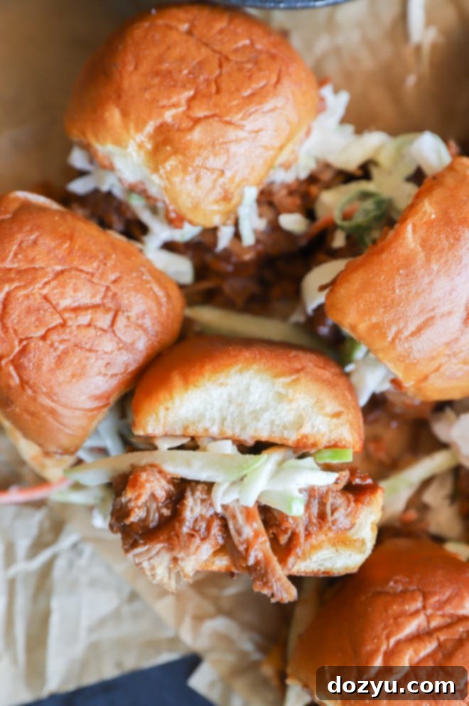 Instant Pot pulled pork sliders with coleslaw and a side dish