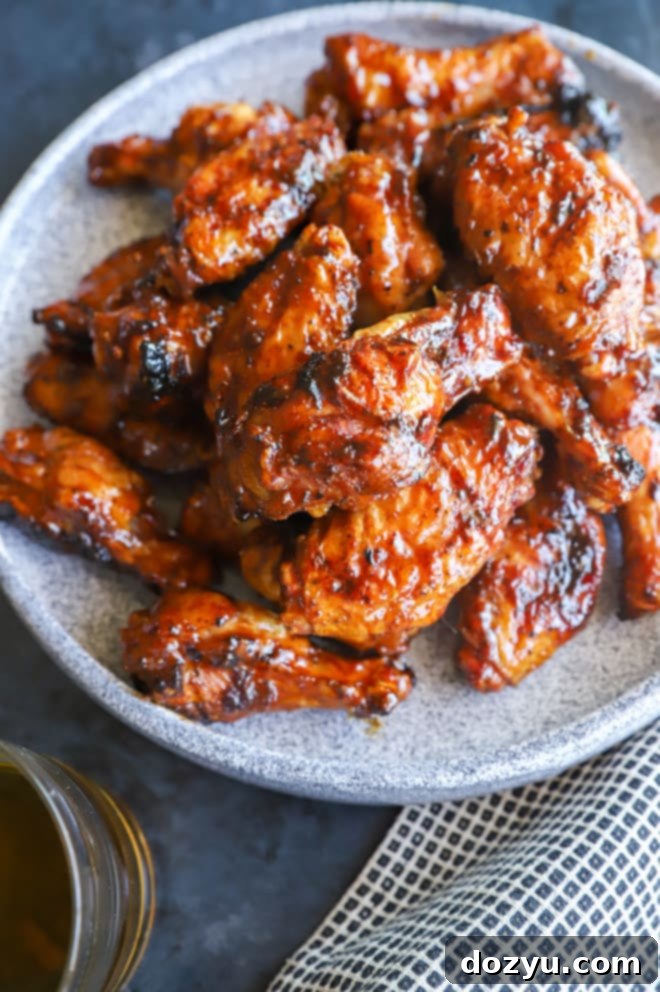 Blazing Honey Bourbon Wings 8 A serving of hot honey whiskey wings, glistening with sauce and ready to eat