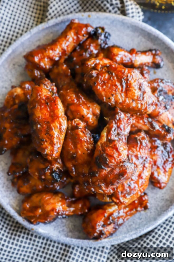 Blazing Honey Bourbon Wings 4 Overhead image of chicken wings on a plate, beautifully glazed