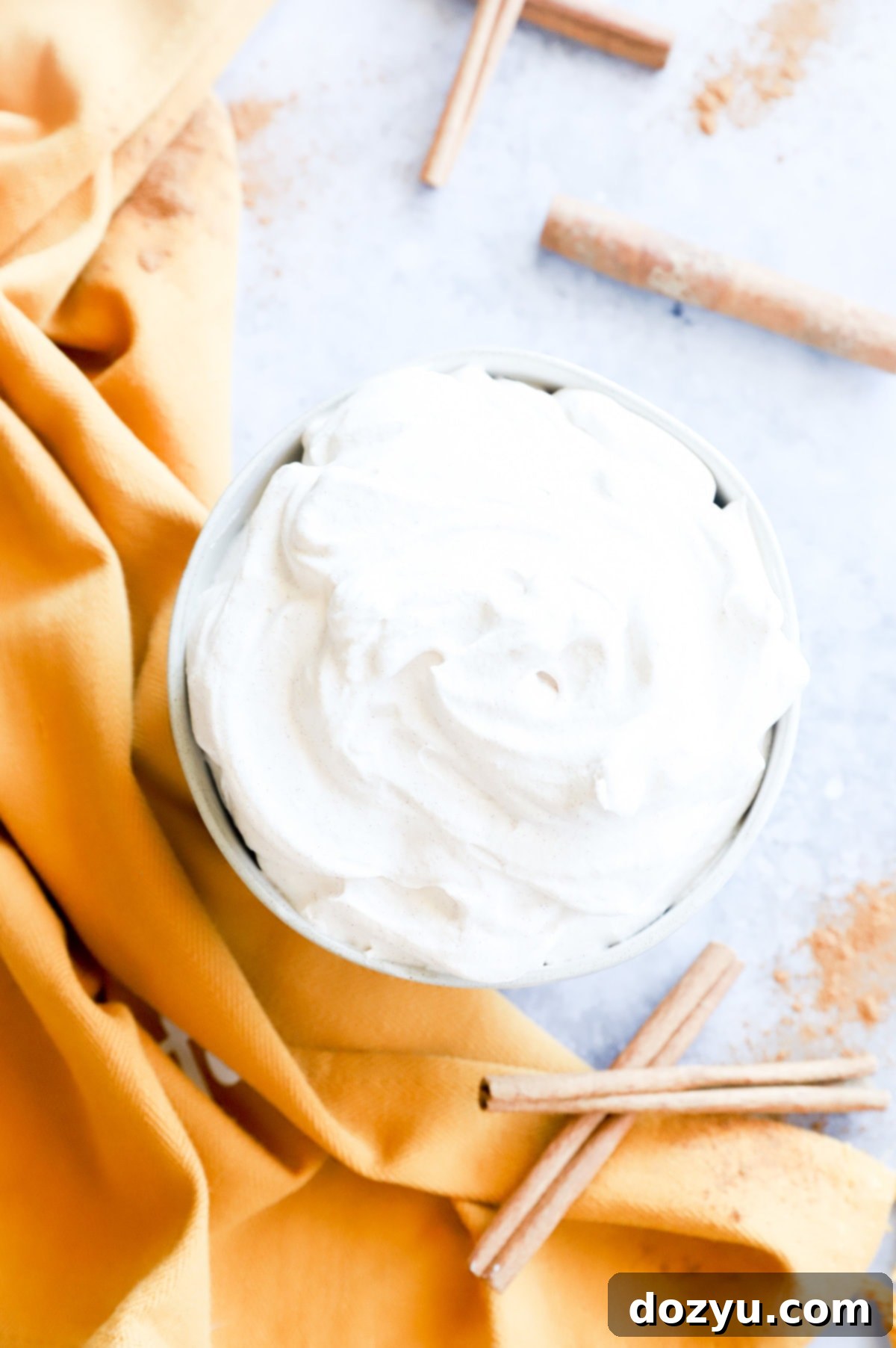cinnamon whipped cream in a bowl image