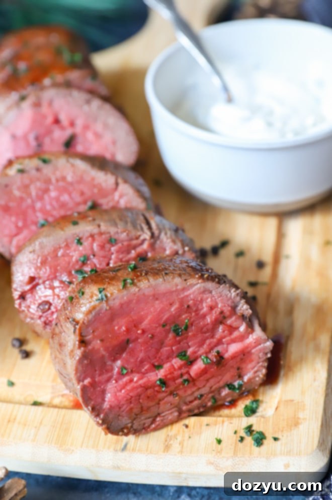 sliced beef tenderloin roast image