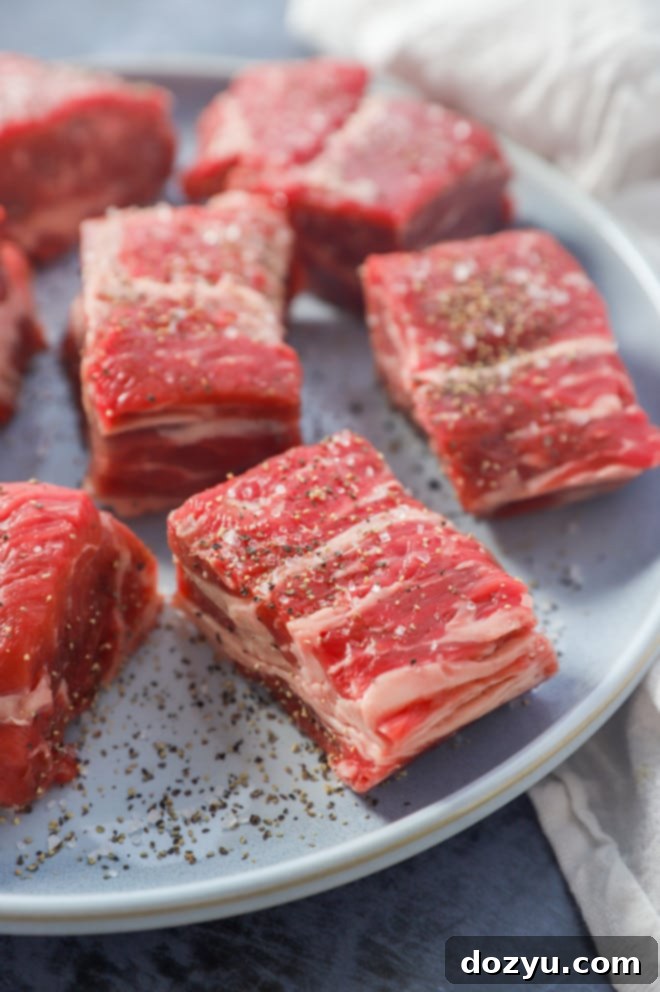 Short ribs seasoned and ready for searing