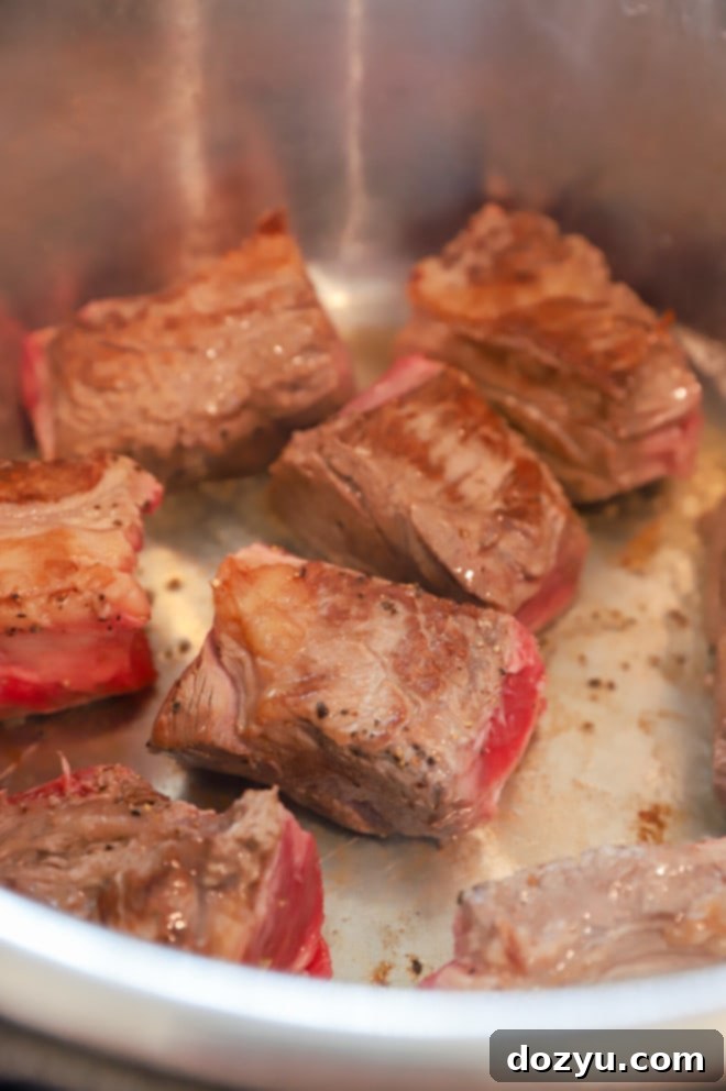 Short ribs searing in the Instant Pot