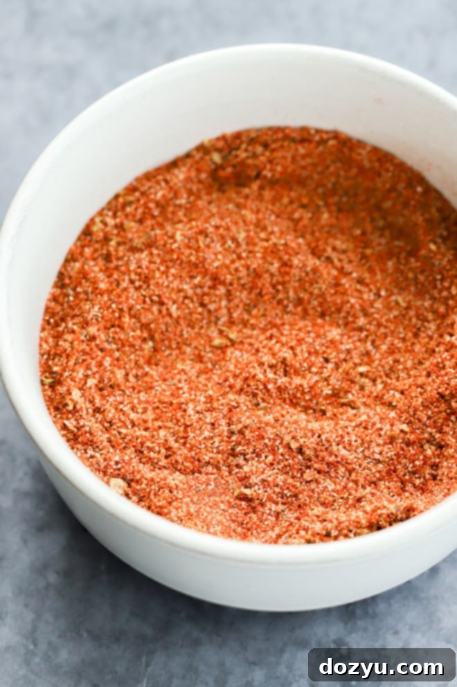 The Ultimate Chicken Taco Spice Mix 6 Bowl with chicken taco seasoning after mixing