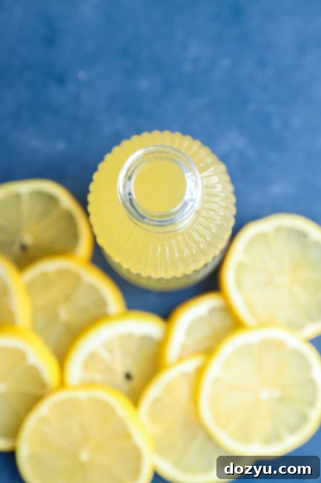 lemon simple syrup in jar overhead image