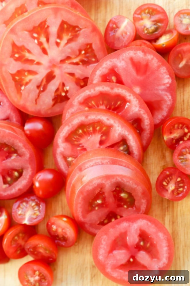 Sliced tomatoes on a cutting board picture