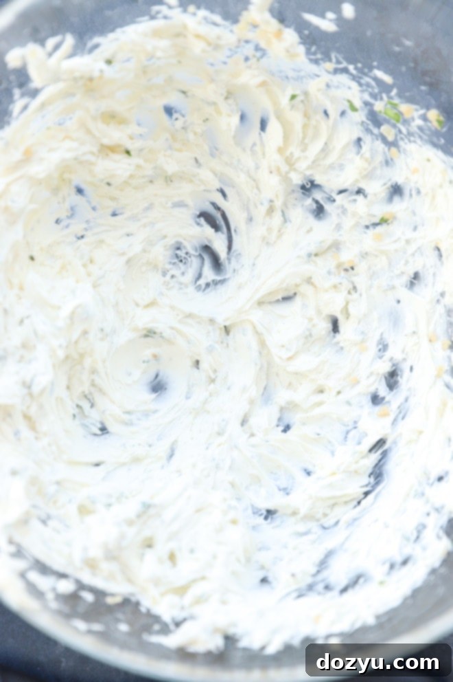 Photo of cream cheese and herbs mixture in a bowl