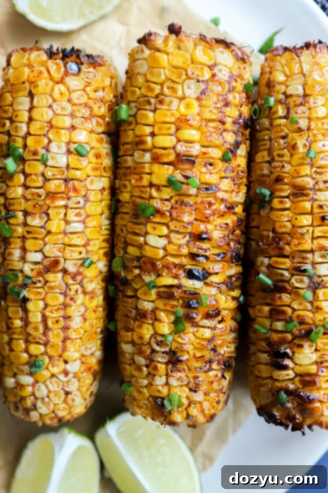 Overhead image of corn on the cob with lime