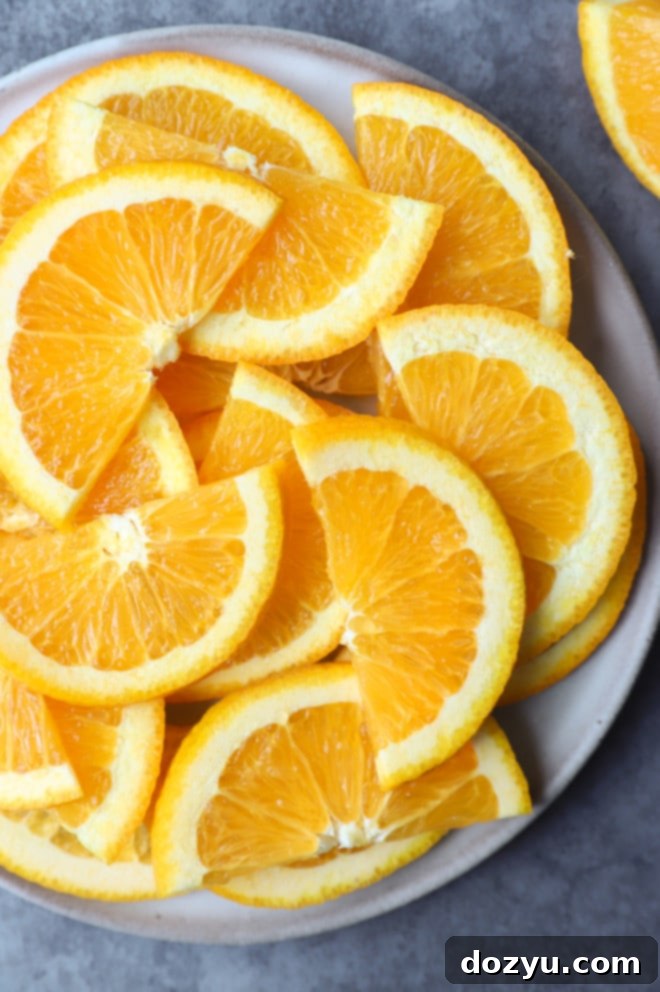 orange slices on a grey plate