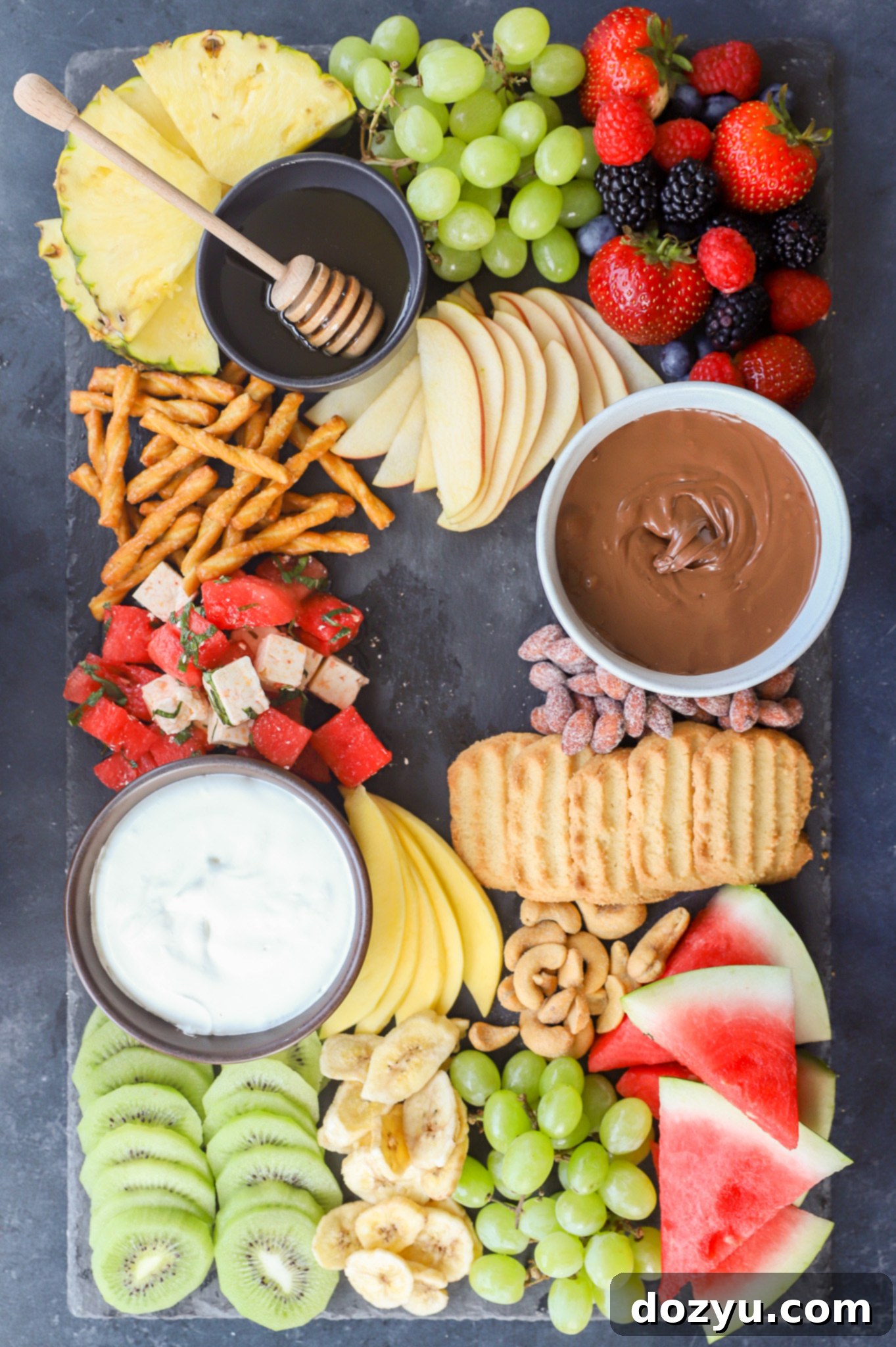 Ingredients for a fruit charcuterie board on display