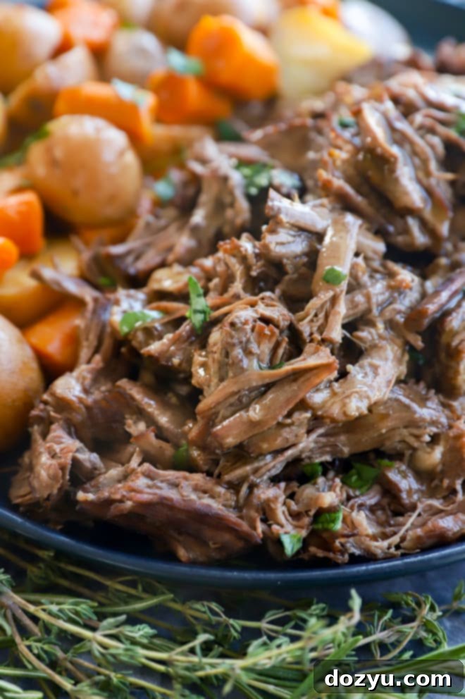 Tender cooked chuck roast with potatoes and carrots