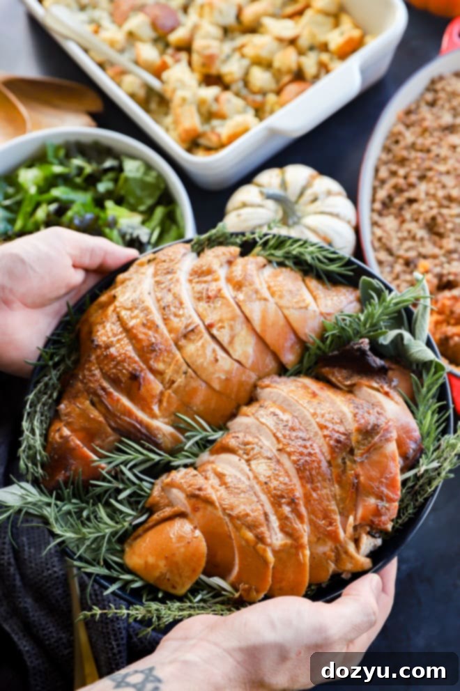 Signature Smoked Turkey Breast 11 hands holding dish for thanksgiving over side dishes