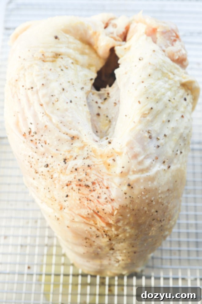 Signature Smoked Turkey Breast 4 Brined turkey breast on wire rack
