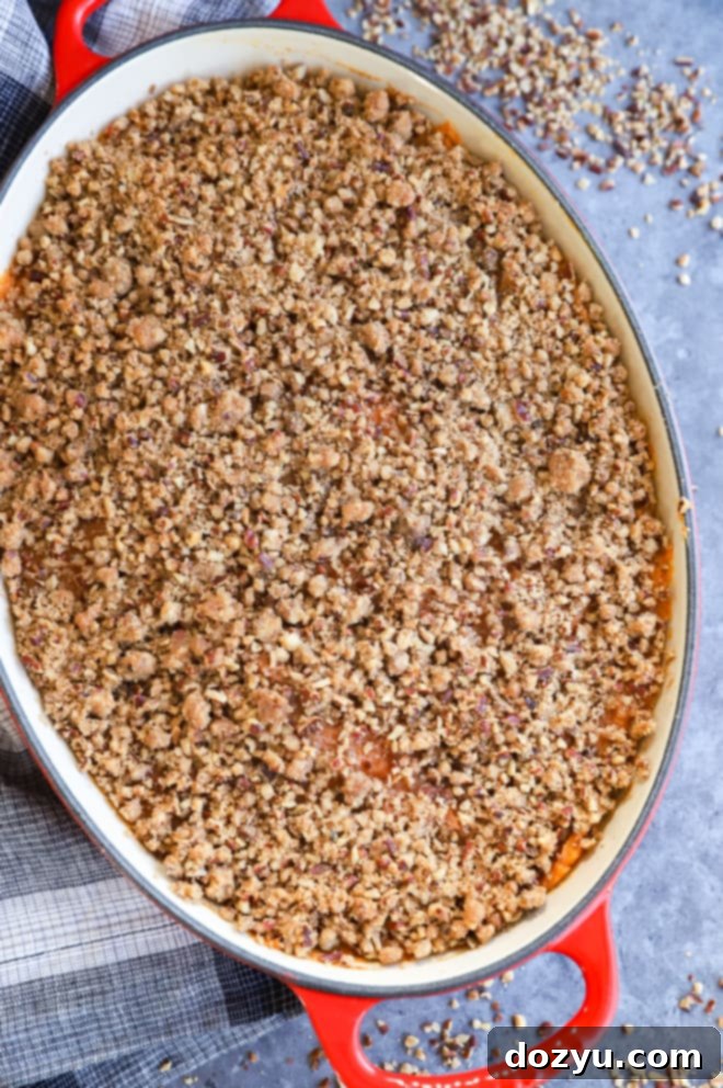 Golden Sweet Potato Cloud 9 Pecan streusel topping on Thanksgiving side dish in baking pan