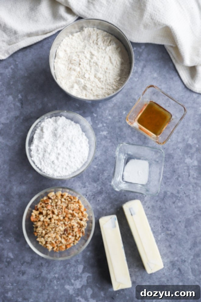 Ingredients for snowball cookies laid out on a kitchen counter