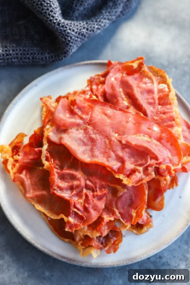 Plate of a baked snack thinly sliced ham