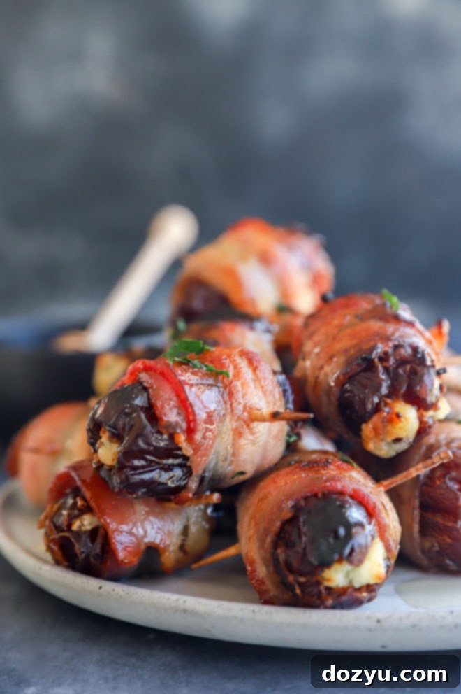 Plate of pork and dried fruit stuffed with goat cheese and drizzled with honey