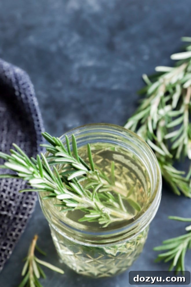 Aromatic Rosemary Nectar 6 Bottle of fresh homemade rosemary simple syrup with rosemary sprigs