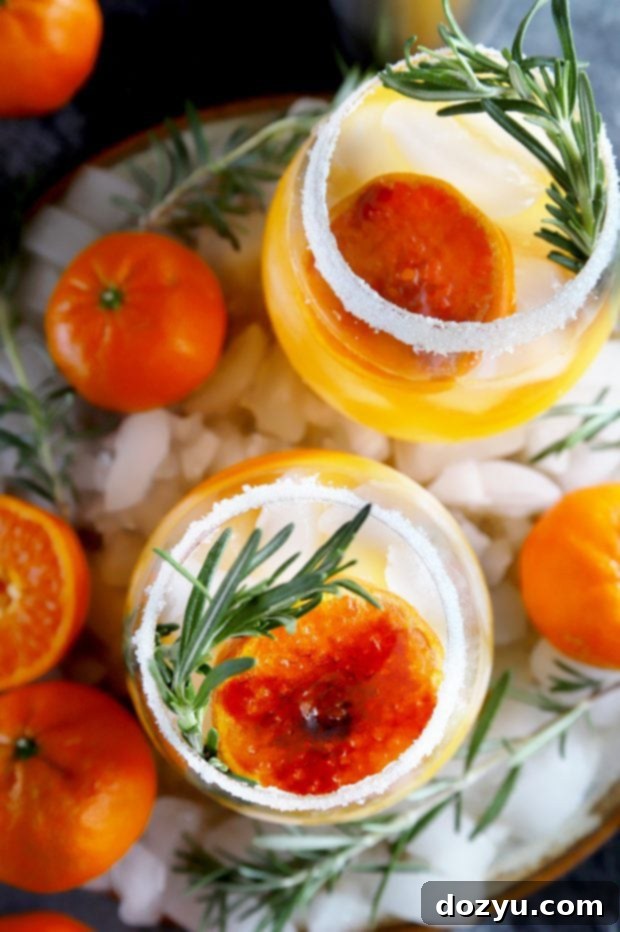 Aromatic Rosemary Nectar 8 Clementine Mezcal Margarita with rosemary garnish