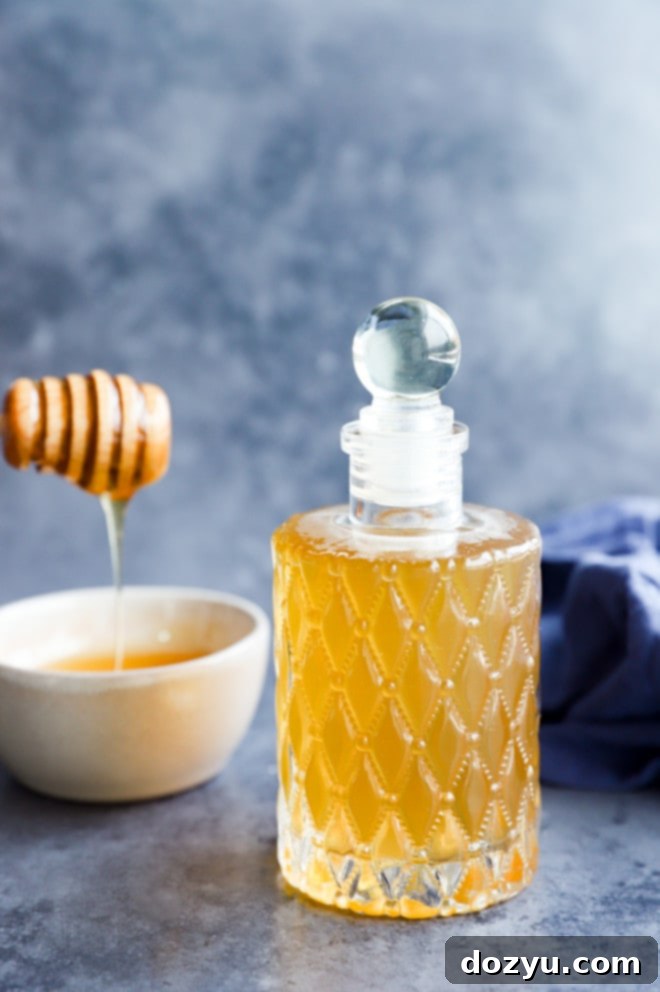 easy liquid sweetener in a bottle, showcasing a beautifully bottled honey simple syrup ready for use