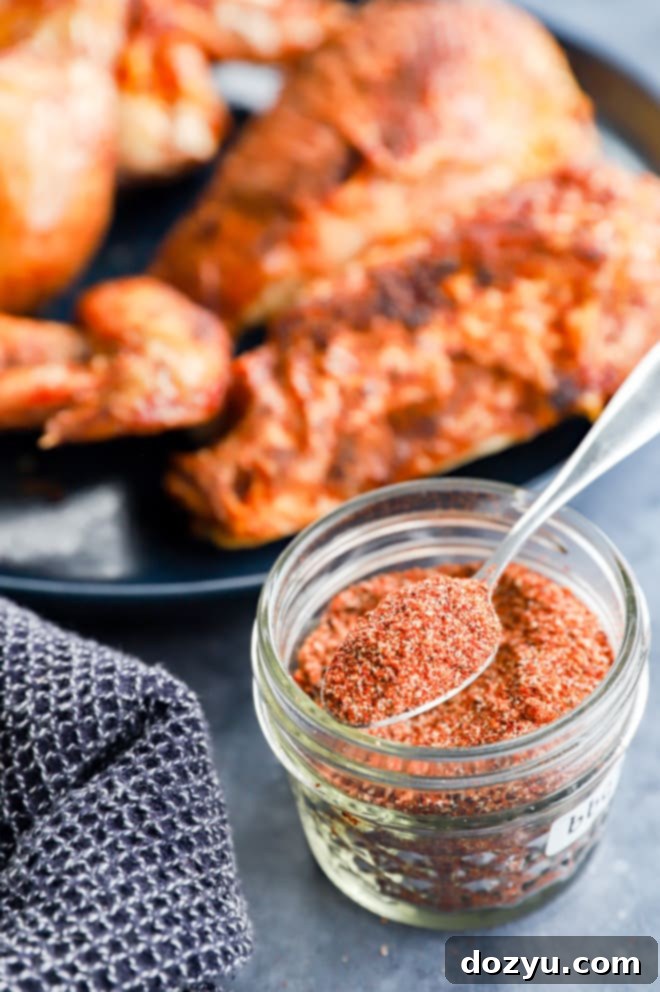 Grilled poultry on a plate with dry seasoning