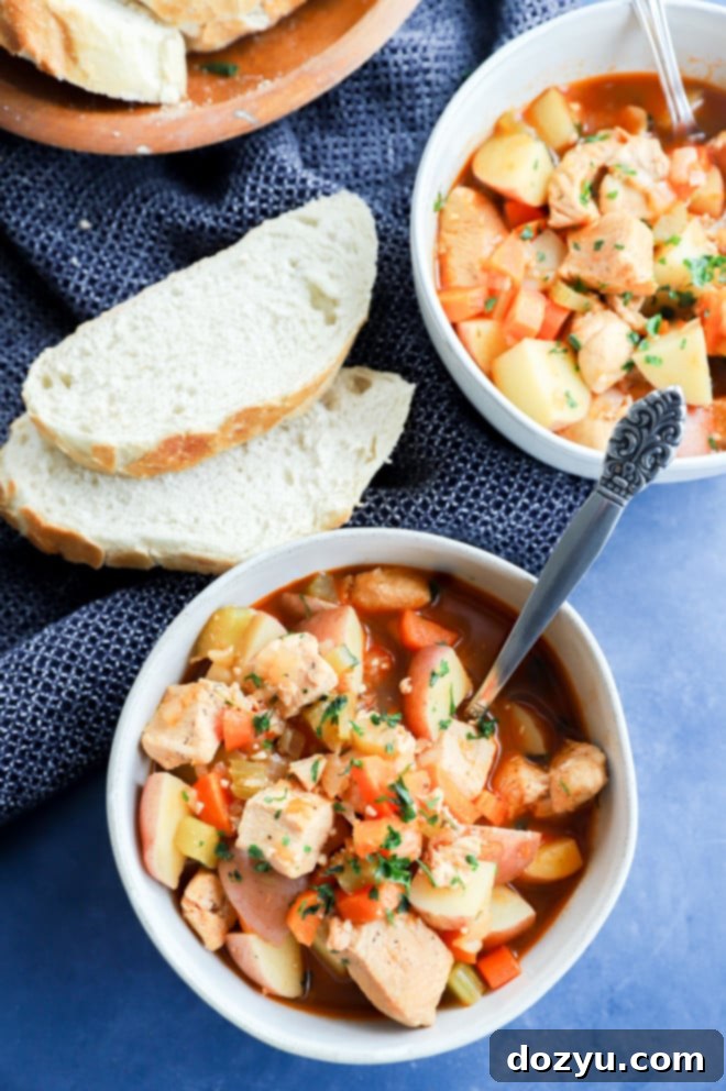 Hearty Instant Pot Chicken Stew 2 Instant Pot Chicken stew in bowls with slices of bread, ready to serve