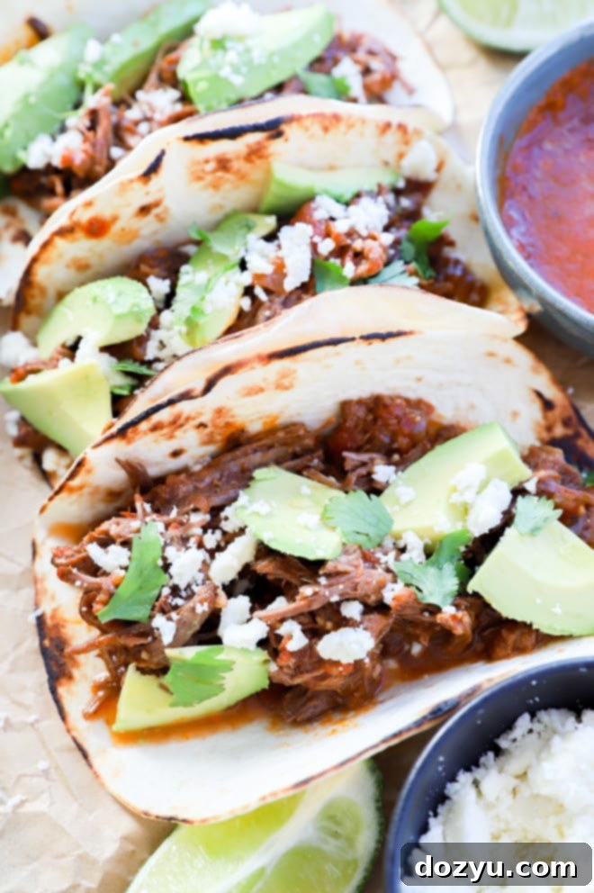 image of tortillas with meat inside and savory toppings
