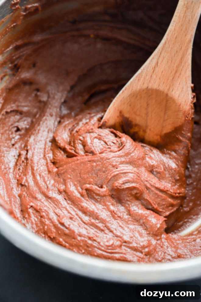 Hoppy Easter Brownies 5 brownie batter in bowl with a spoon