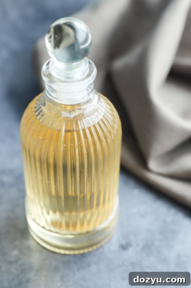 Elegant bottle of homemade vanilla simple syrup, ready for use in drinks and desserts