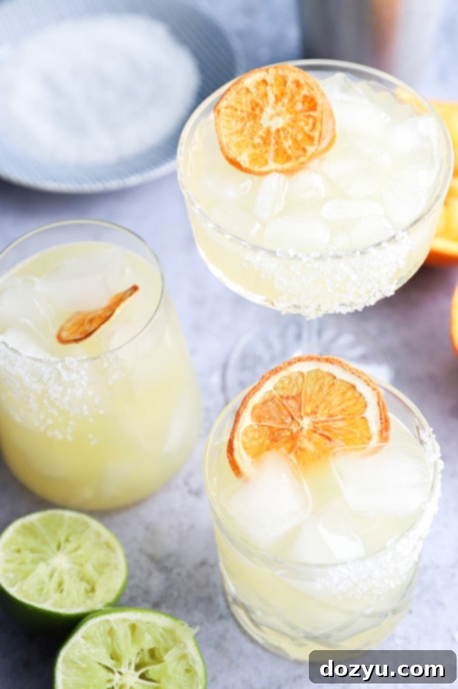 Orange slices garnishing tequila cocktails image