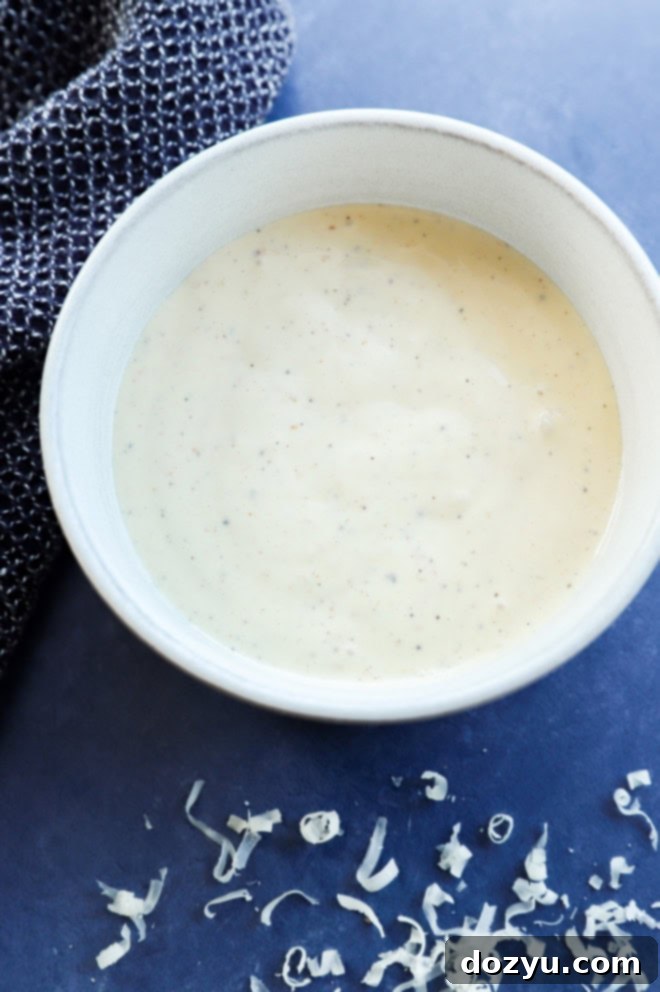 bowl of creamy, smooth homemade Caesar dressing