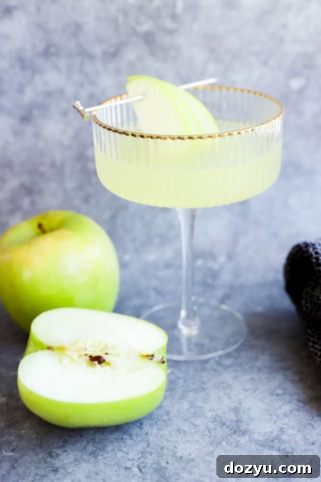 coupe glass with green fall cocktail