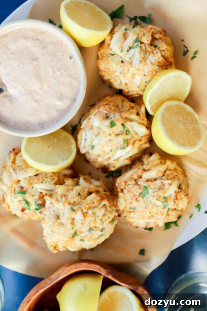 easy seafood appetizer with lemons on platter with sauce