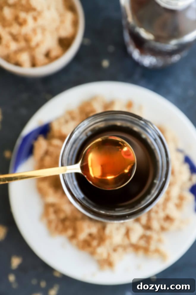 spooning brown sugar simple syrup